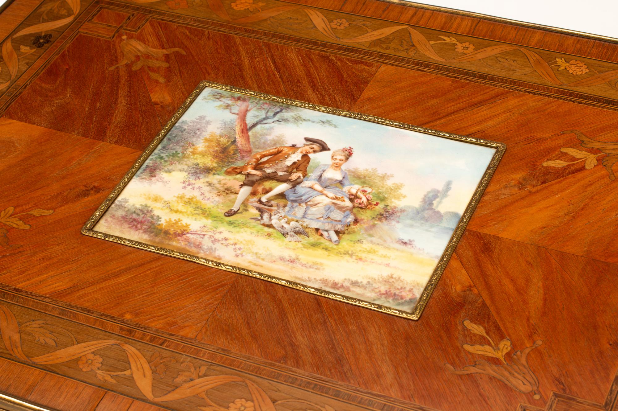 A Pair of Louis XV Style Gilt Bronze and Porcelain Mounted Marquetry Tables