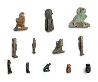 Twelve Egyptian Faience and Stone Horus Amulets