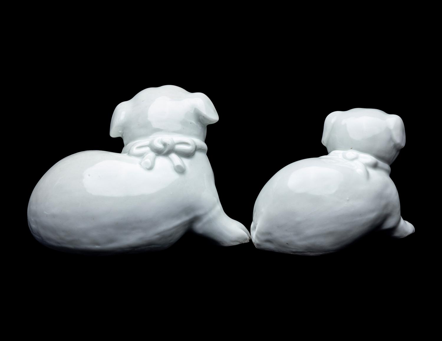 A Pair of Japanese Hirado White Glazed Porcelain Figures of Puppies