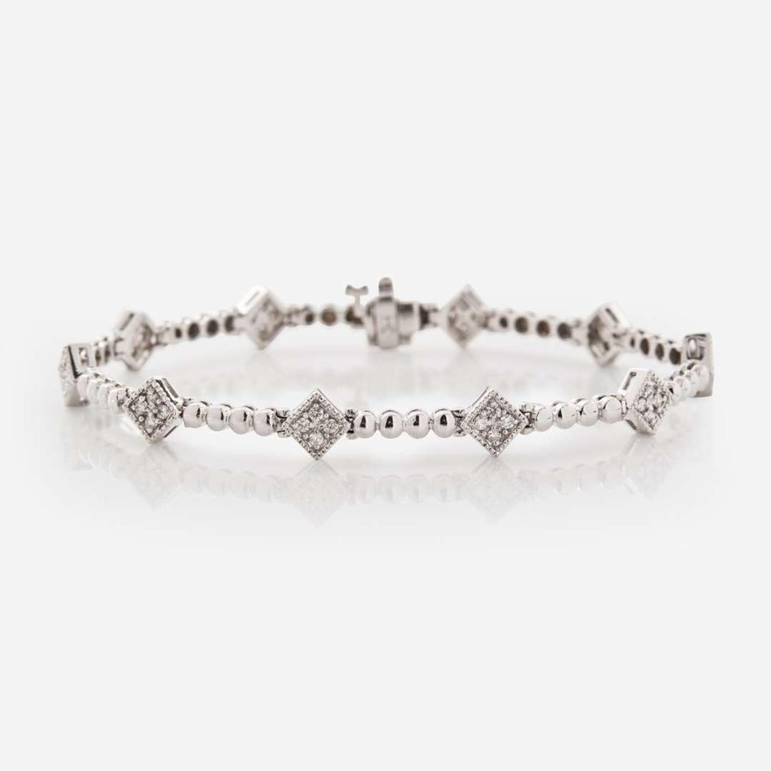 A 14K White Gold and Diamond Bracelet
