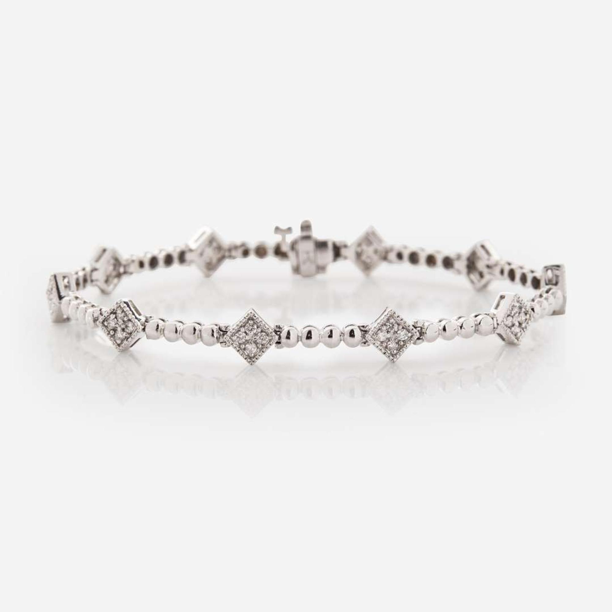 A 14K White Gold and Diamond Bracelet