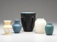 Five Carved and Mat Vases