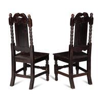 A Pair of Jacobean Revival Oak Side Chairs