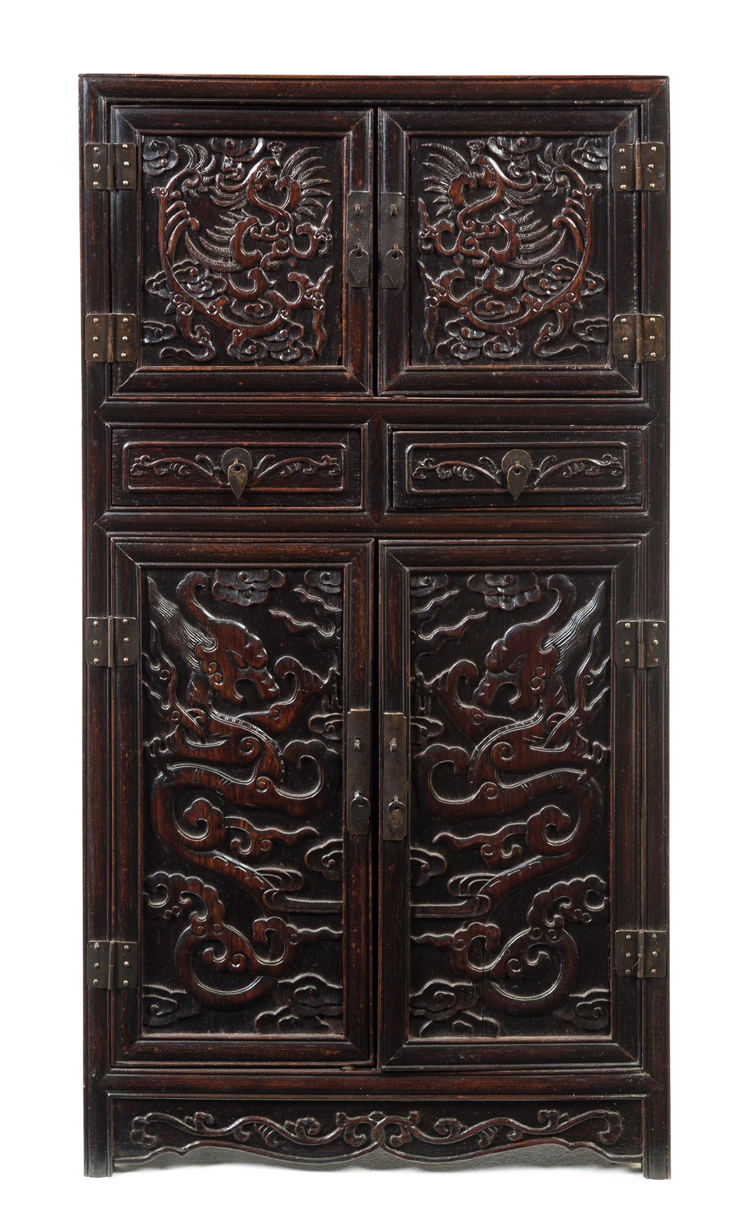 A Carved Hardwood Cabinet