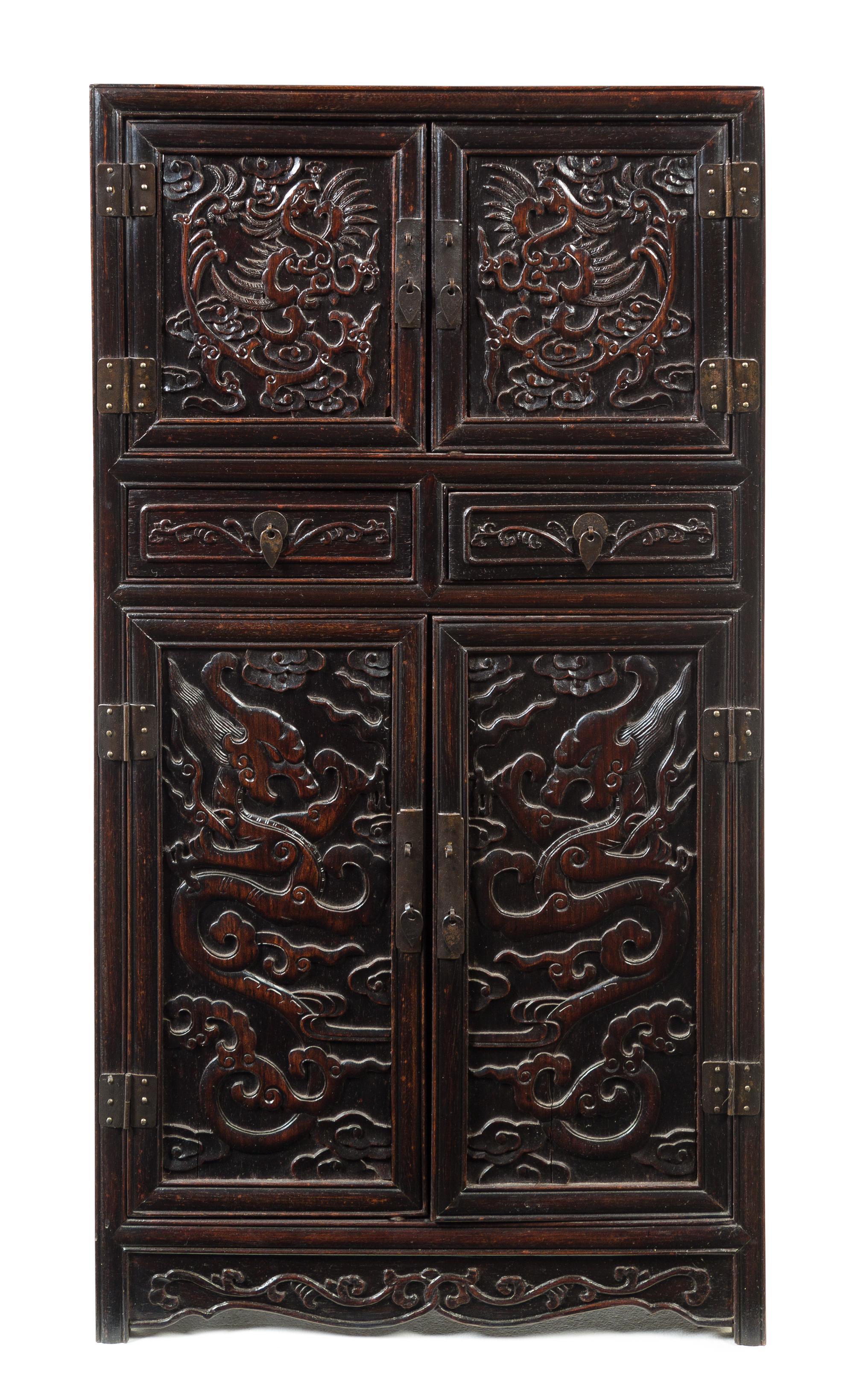 A Carved Hardwood Cabinet