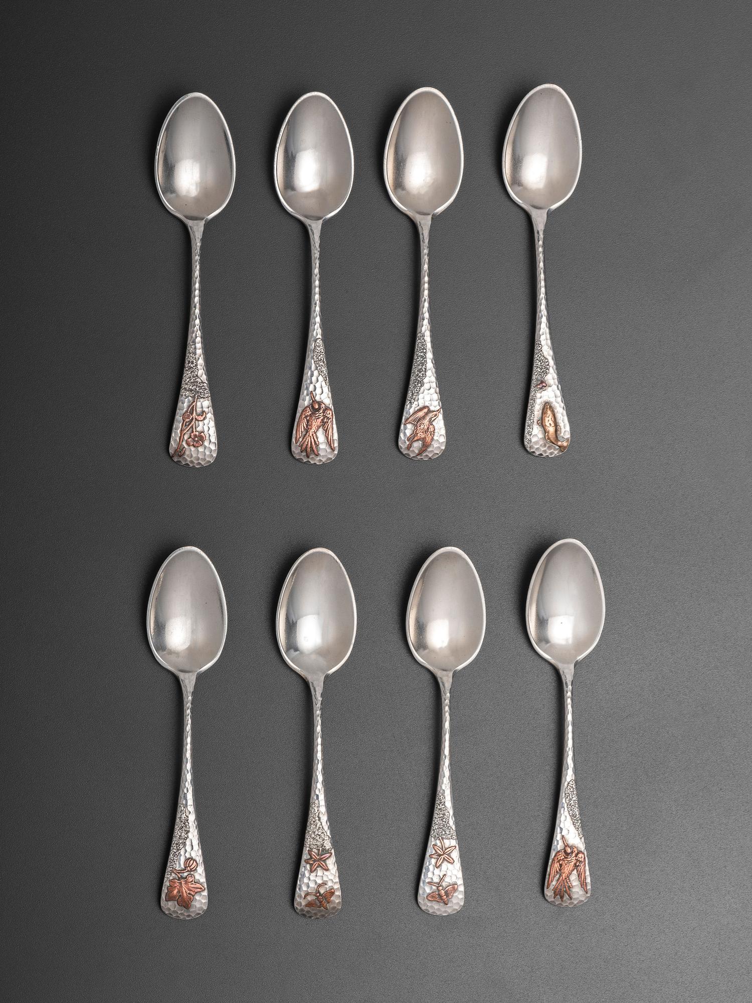 Eight American Silver and Mixed Metal Demitasse Spoons