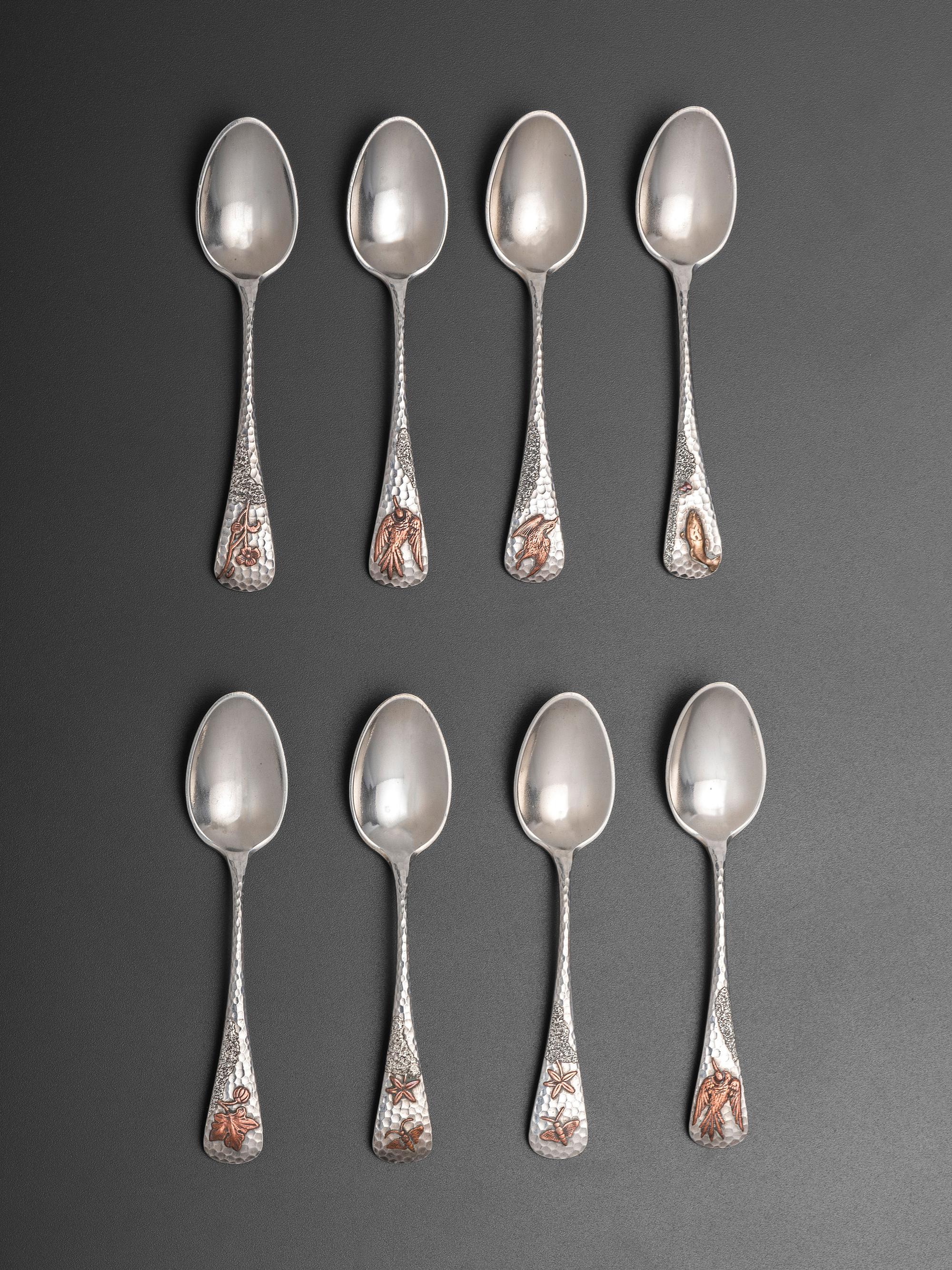 Eight American Silver and Mixed Metal Demitasse Spoons