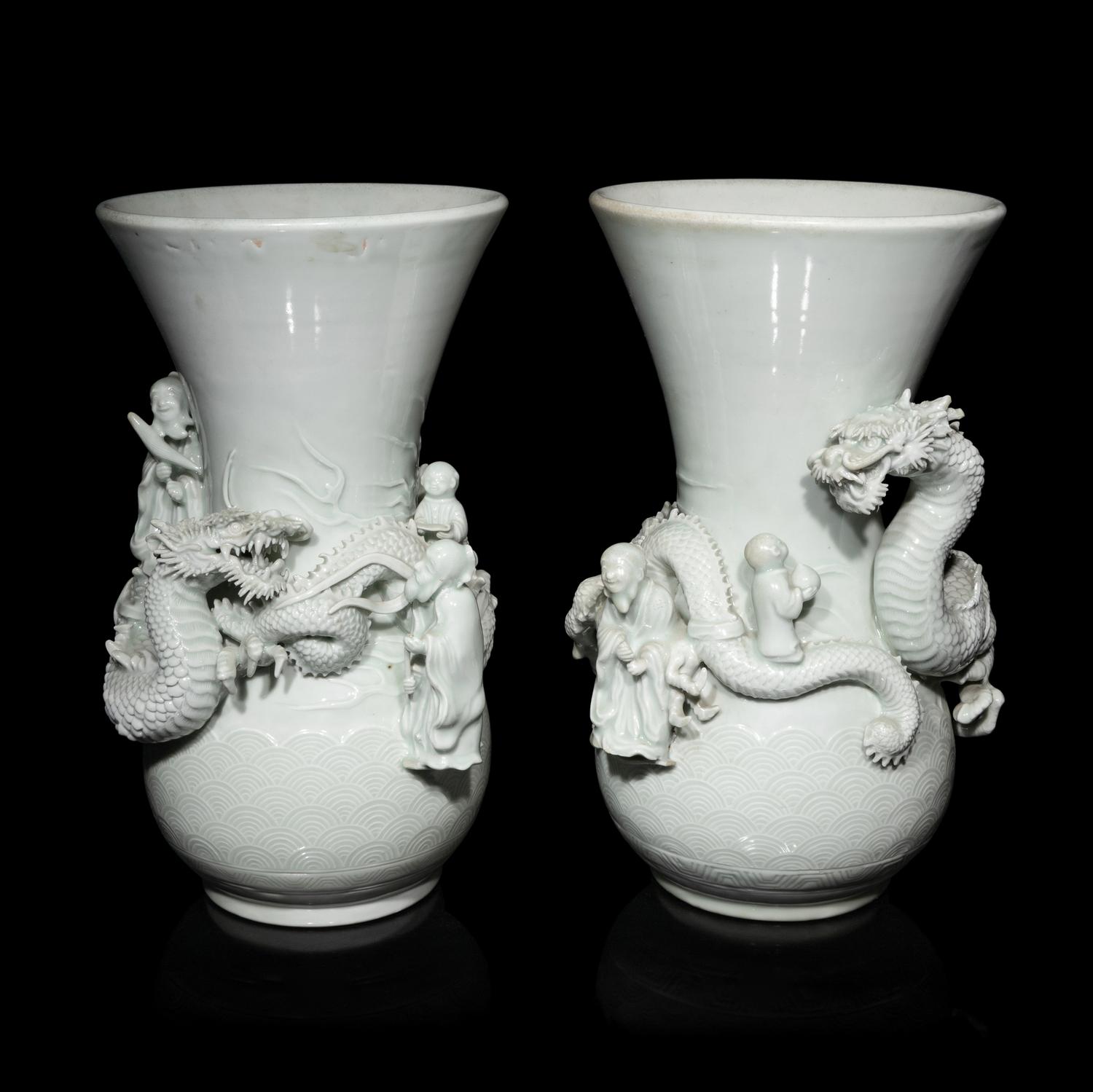 A Pair of Japanese Hirado Molded White Glazed Porcelain Vases, Meiji Period 明治時期 日本鍋島燒白釉龍紋瓶一對