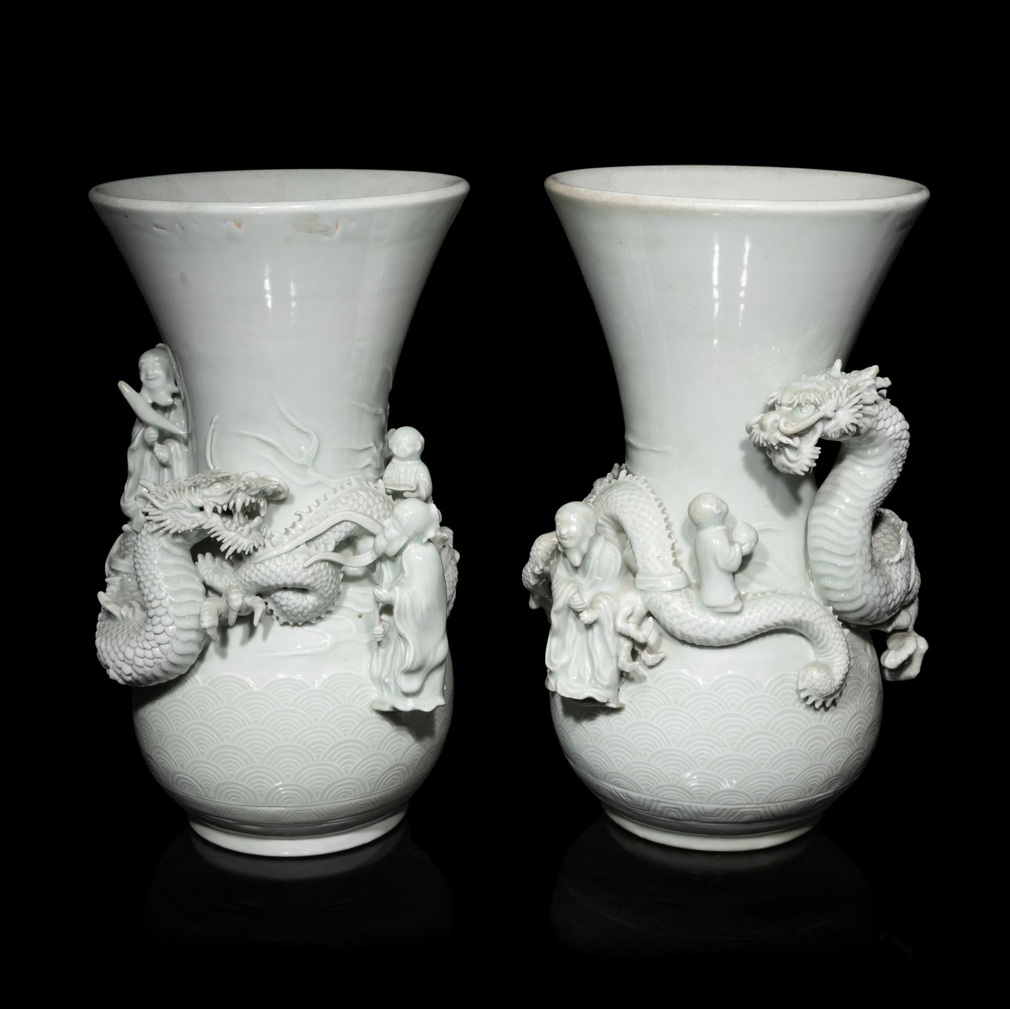 A Pair of Japanese Hirado Molded White Glazed Porcelain Vases, Meiji Period 明治時期 日本鍋島燒白釉龍紋瓶一對