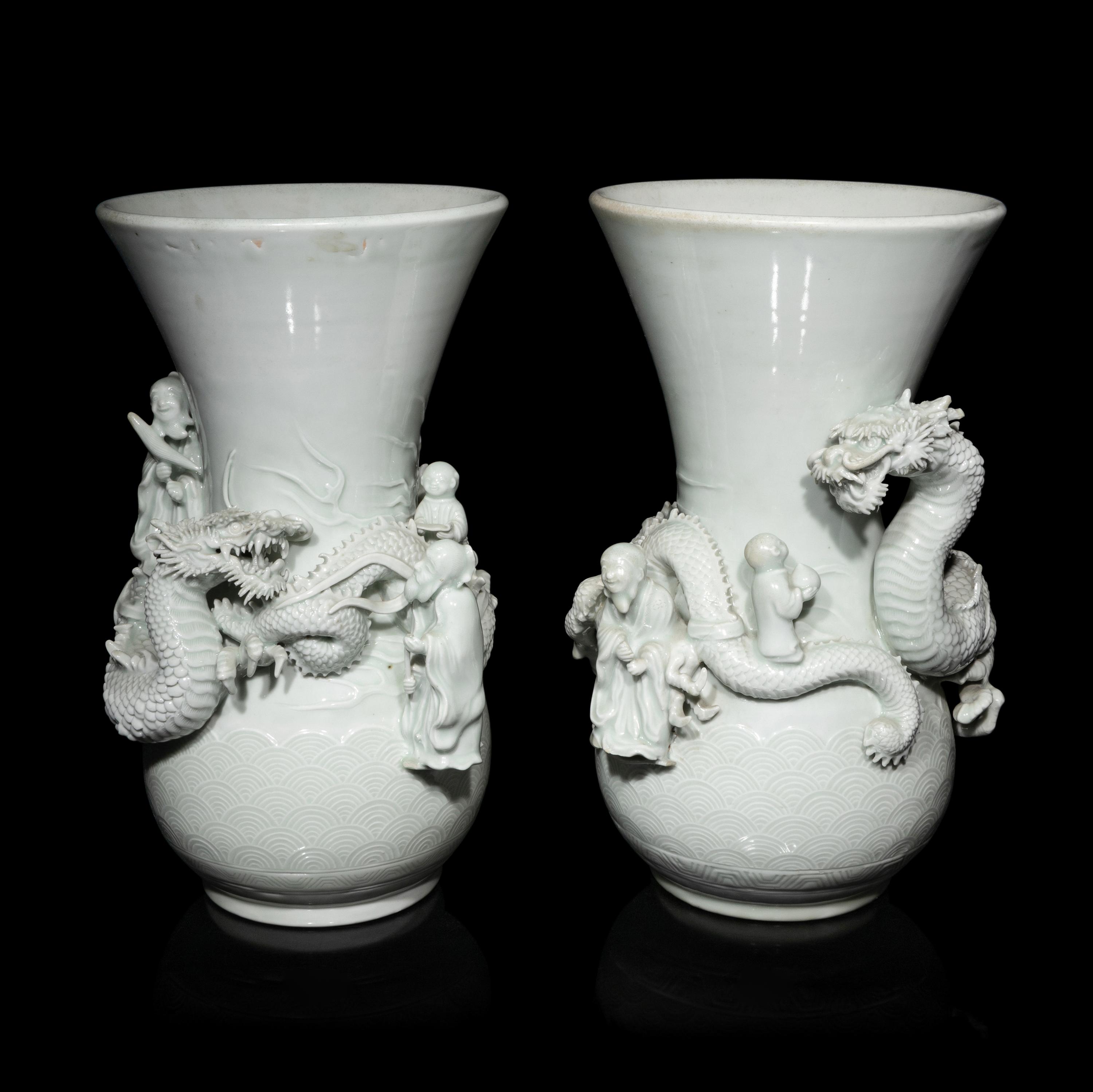 A Pair of Japanese Hirado Molded White Glazed Porcelain Vases, Meiji Period 明治時期 日本鍋島燒白釉龍紋瓶一對