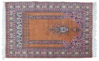 An Oriental Wool Rug 4 feet 2 inches x 6 feet 2 1/2 inches.