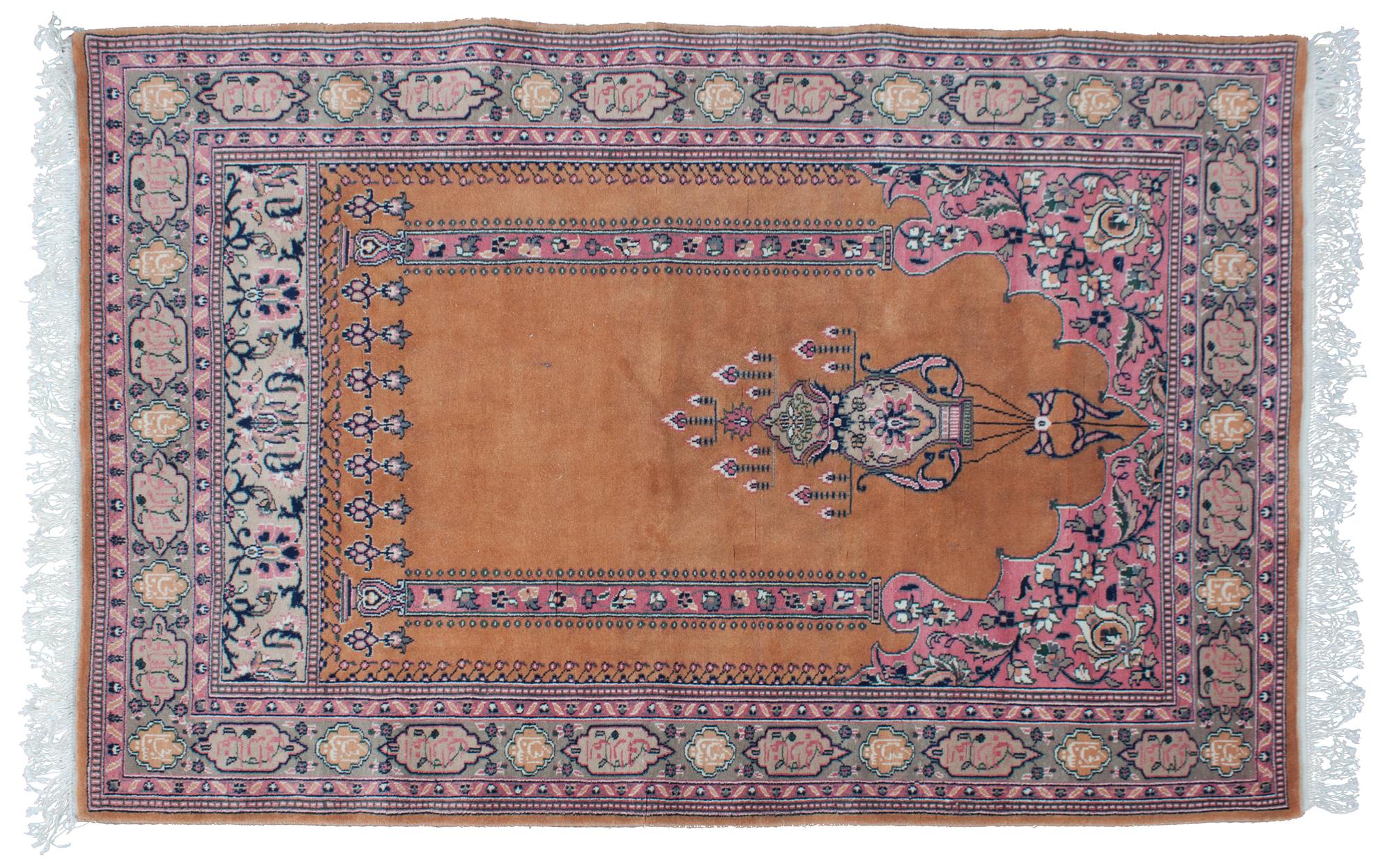 An Oriental Wool Rug 4 feet 2 inches x 6 feet 2 1/2 inches.
