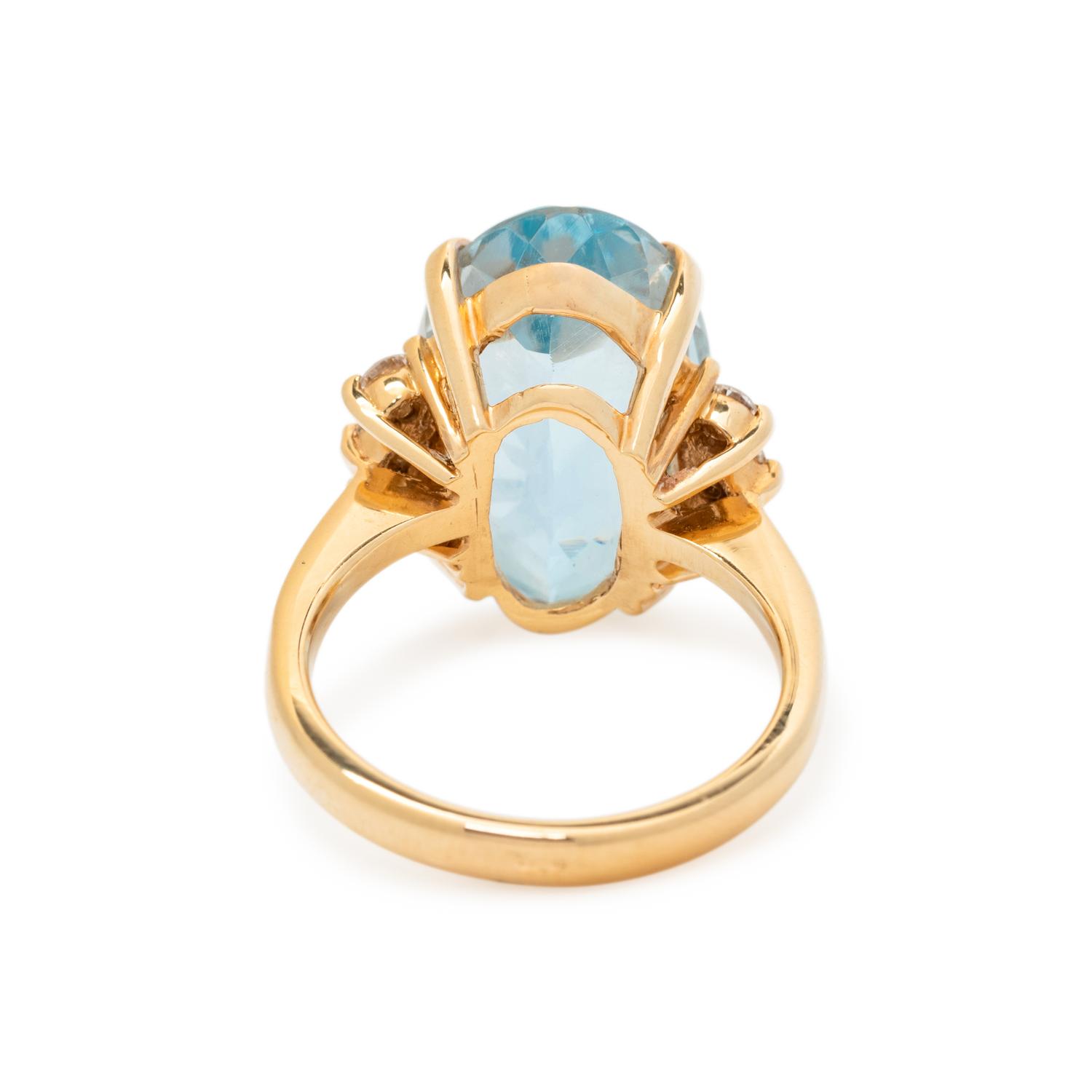 BLUE TOPAZ AND DIAMOND RING