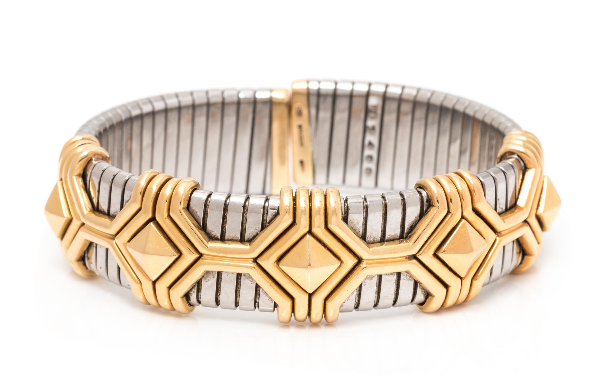 A Stainless Steel and 18 Karat Yellow Gold Tubogas Cuff Bracelet, Bvlgari, 51.90 dwts.