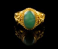 A Chinese 22 Karat Gold and Jadeite Ring Diameter 7/8 inches.