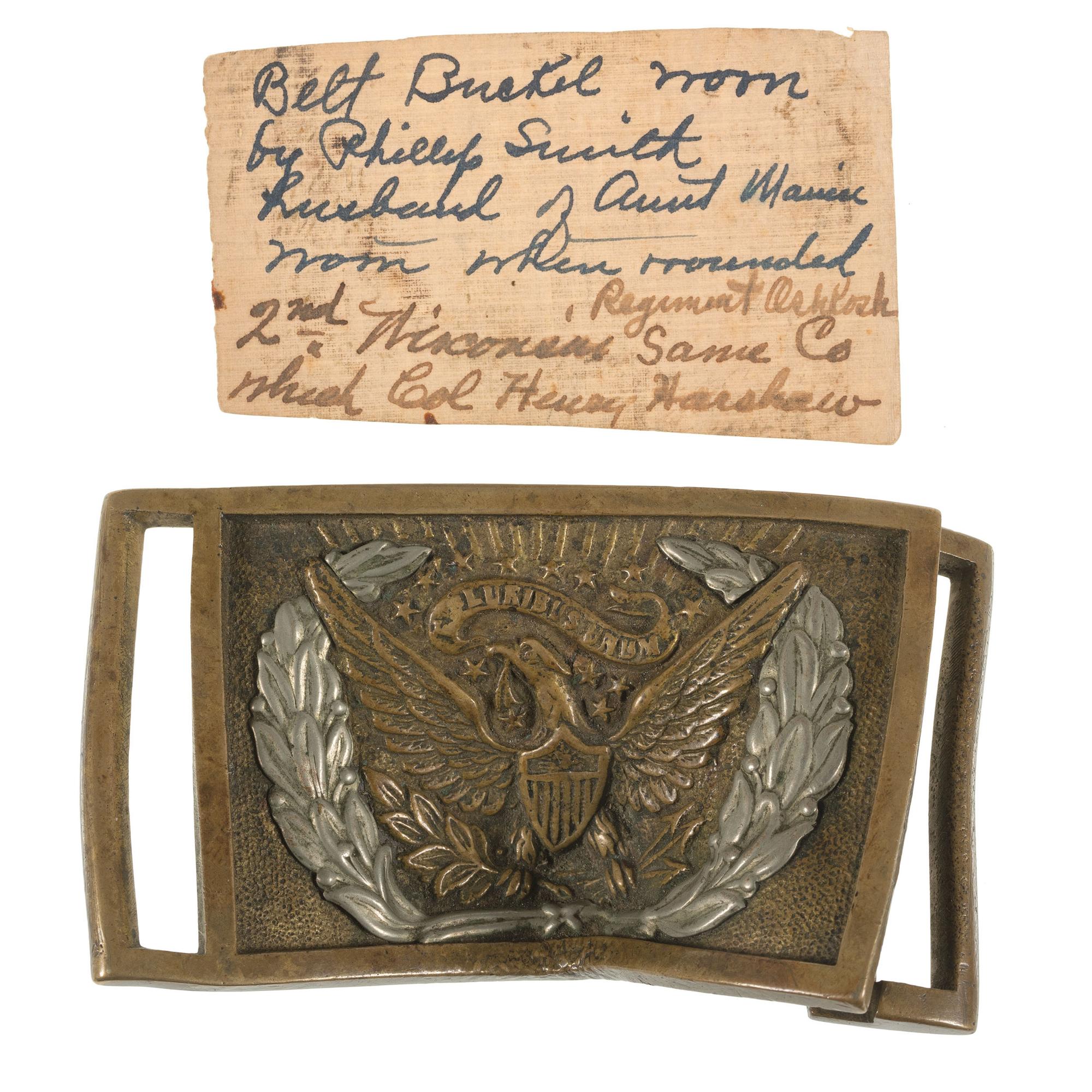 Private Philip E. Smith, Company E, Iron Brigade, 2nd Wisconsin. Bullet-struck Model 1851 NCO belt plate worn when wounded at the Battle of Gainesville, VA, 28 August 1862.