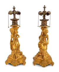 A Pair of French Gilt Bronze Figural Fluid Lamps Converted to Electricity