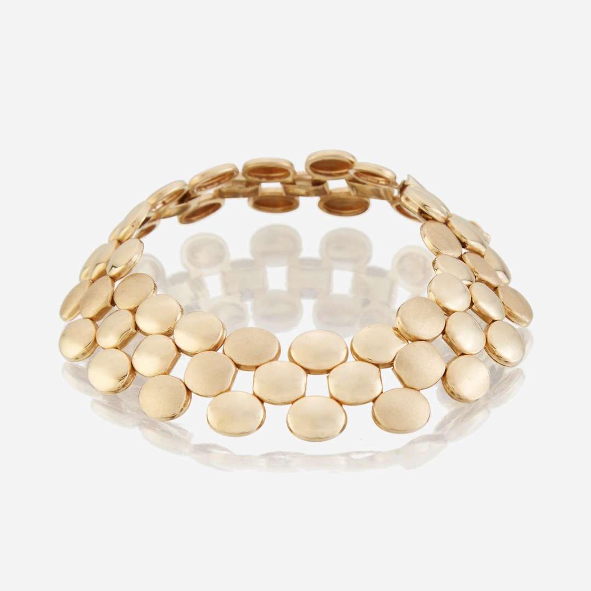 A collection of five fourteen karat gold bracelets