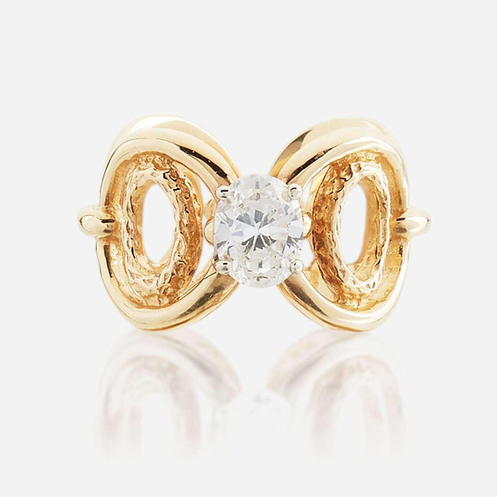 A diamond and gold ring