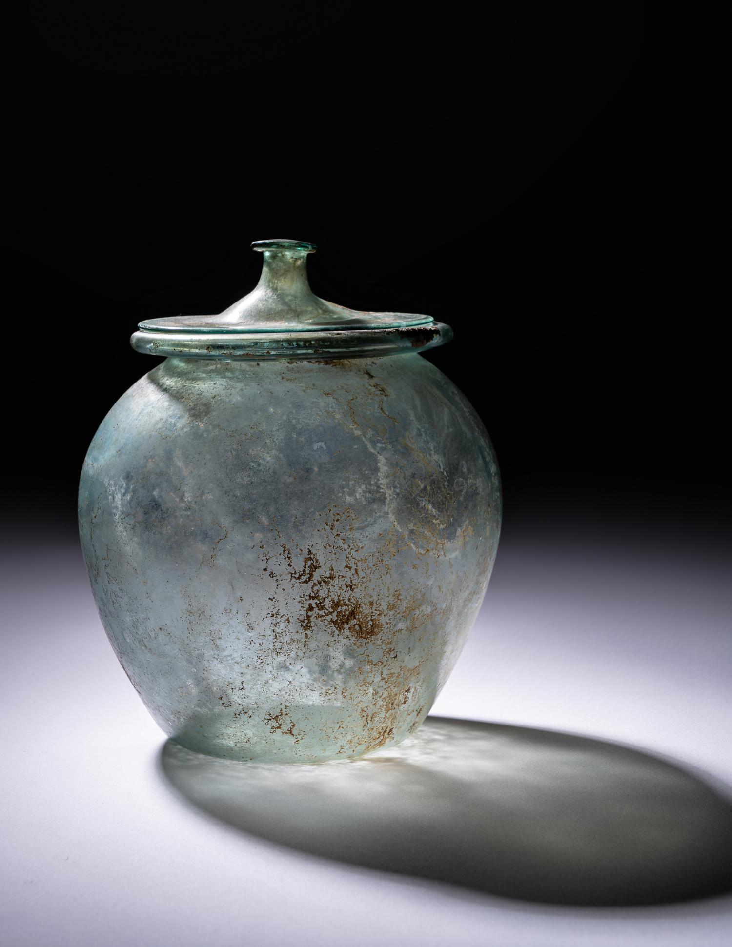 A Roman Blue-Green Glass Cinerary Urn