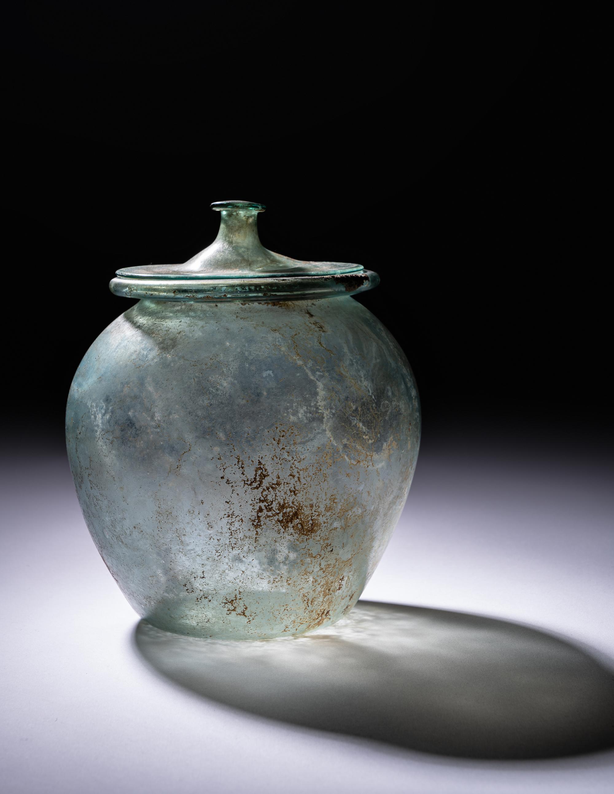 A Roman Blue-Green Glass Cinerary Urn