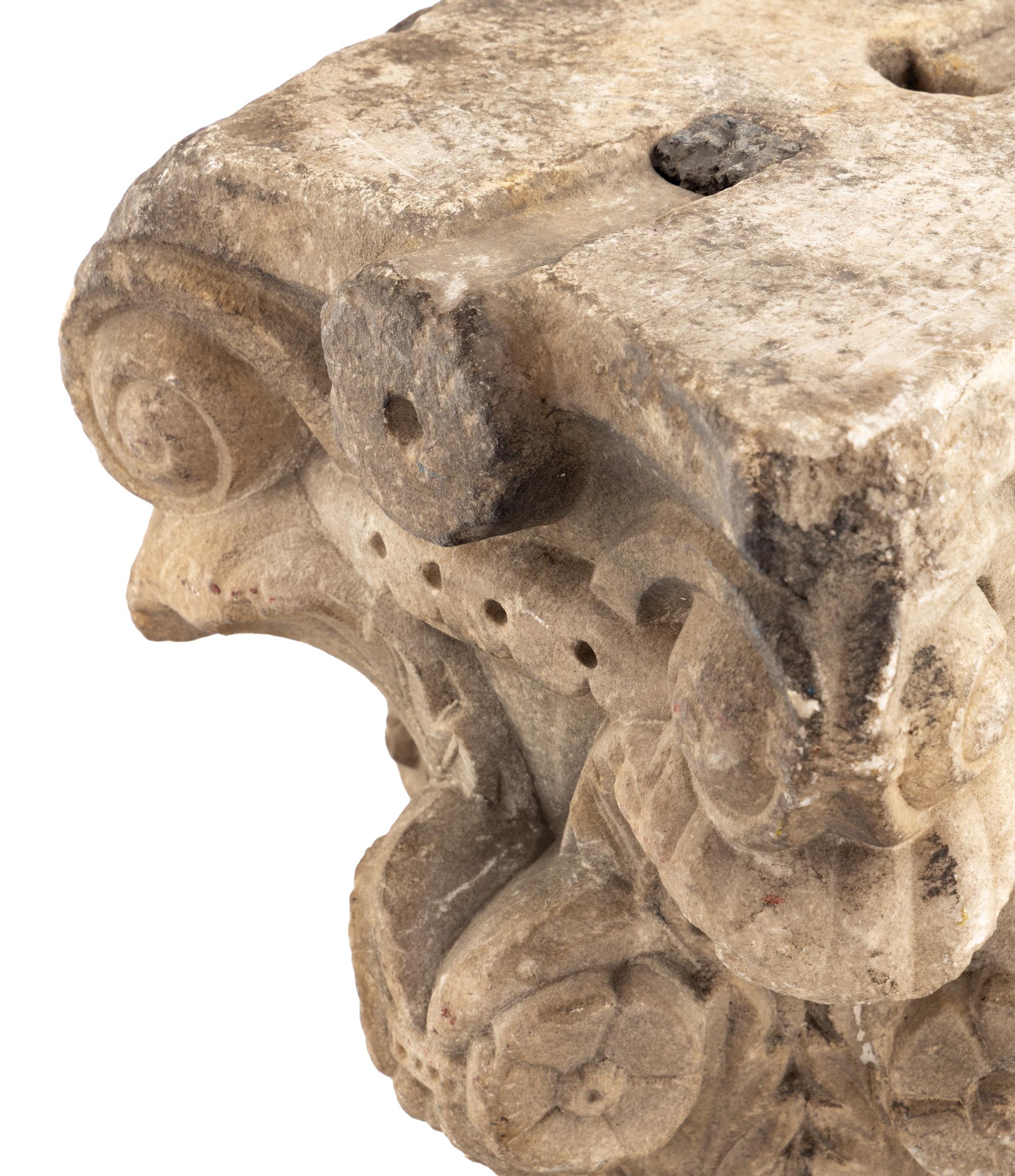 An Italian Carved Stone Capital From Palazzo Odescalchi