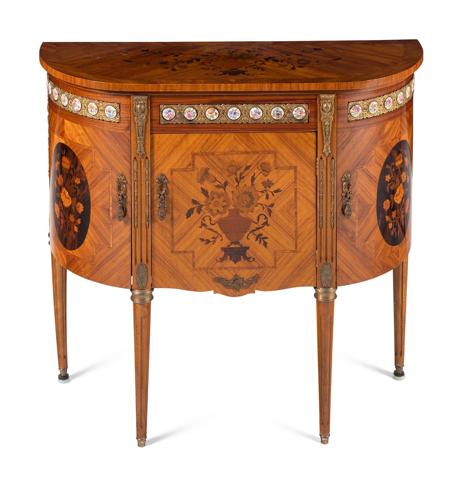 A Louis XVI Style Marquetry, Gilt Metal and Porcelain Mounted Side Cabinet