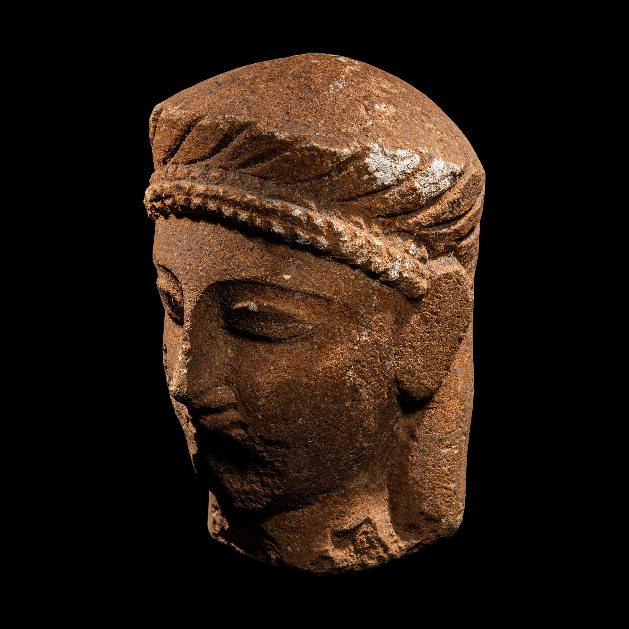A Cypriot Limestone Votive Head