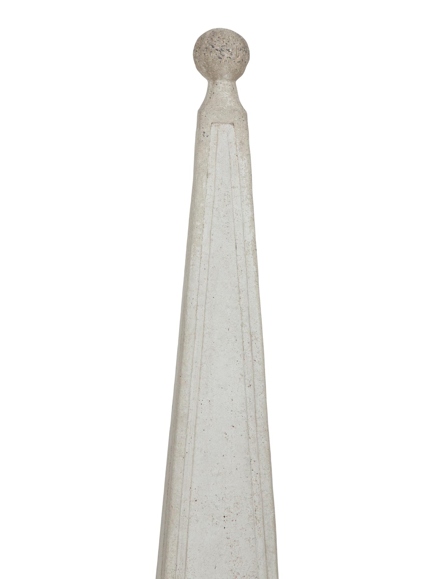 A Pair of Cast Stone Obelisks on Bases