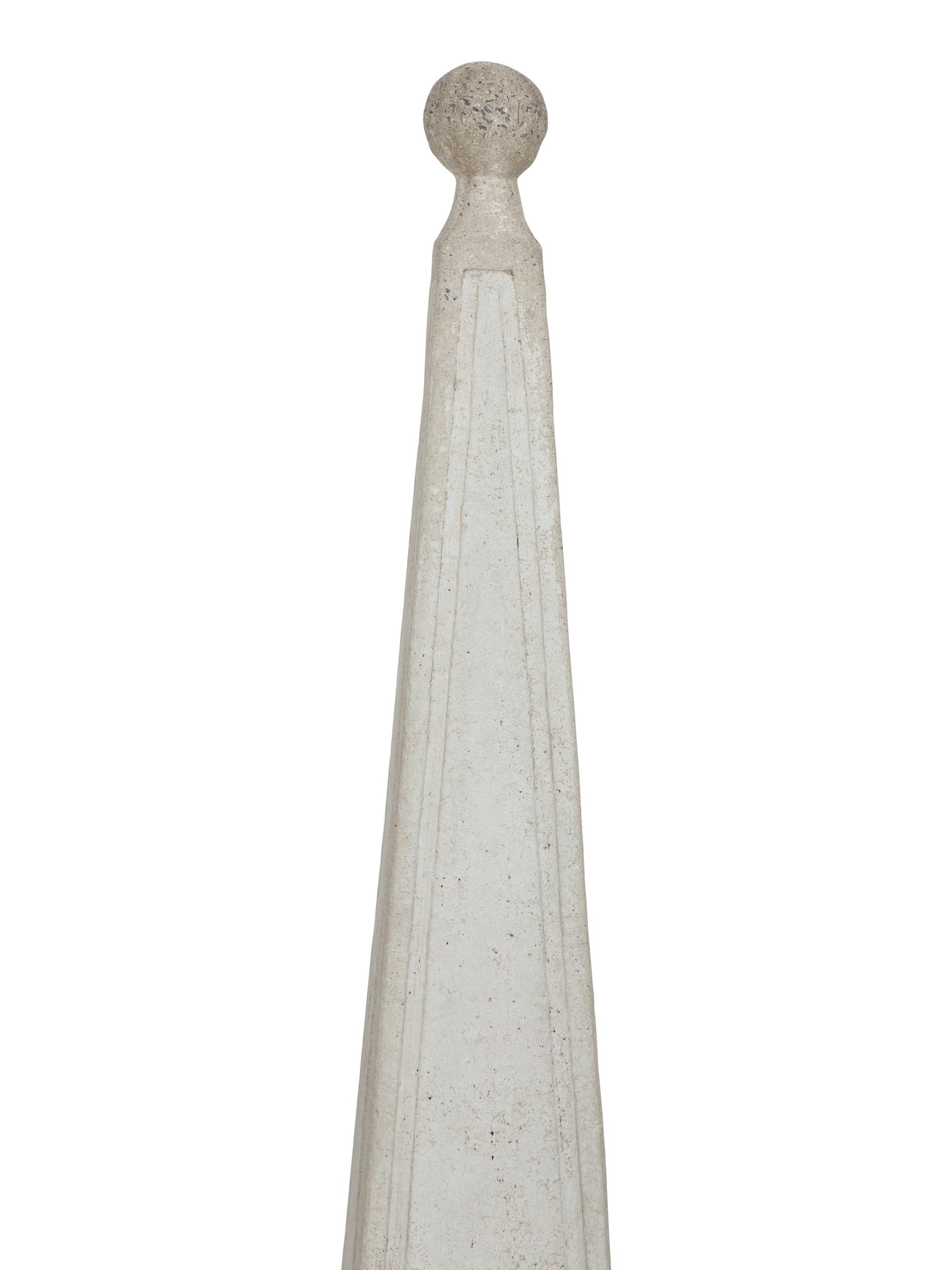 A Pair of Cast Stone Obelisks on Bases