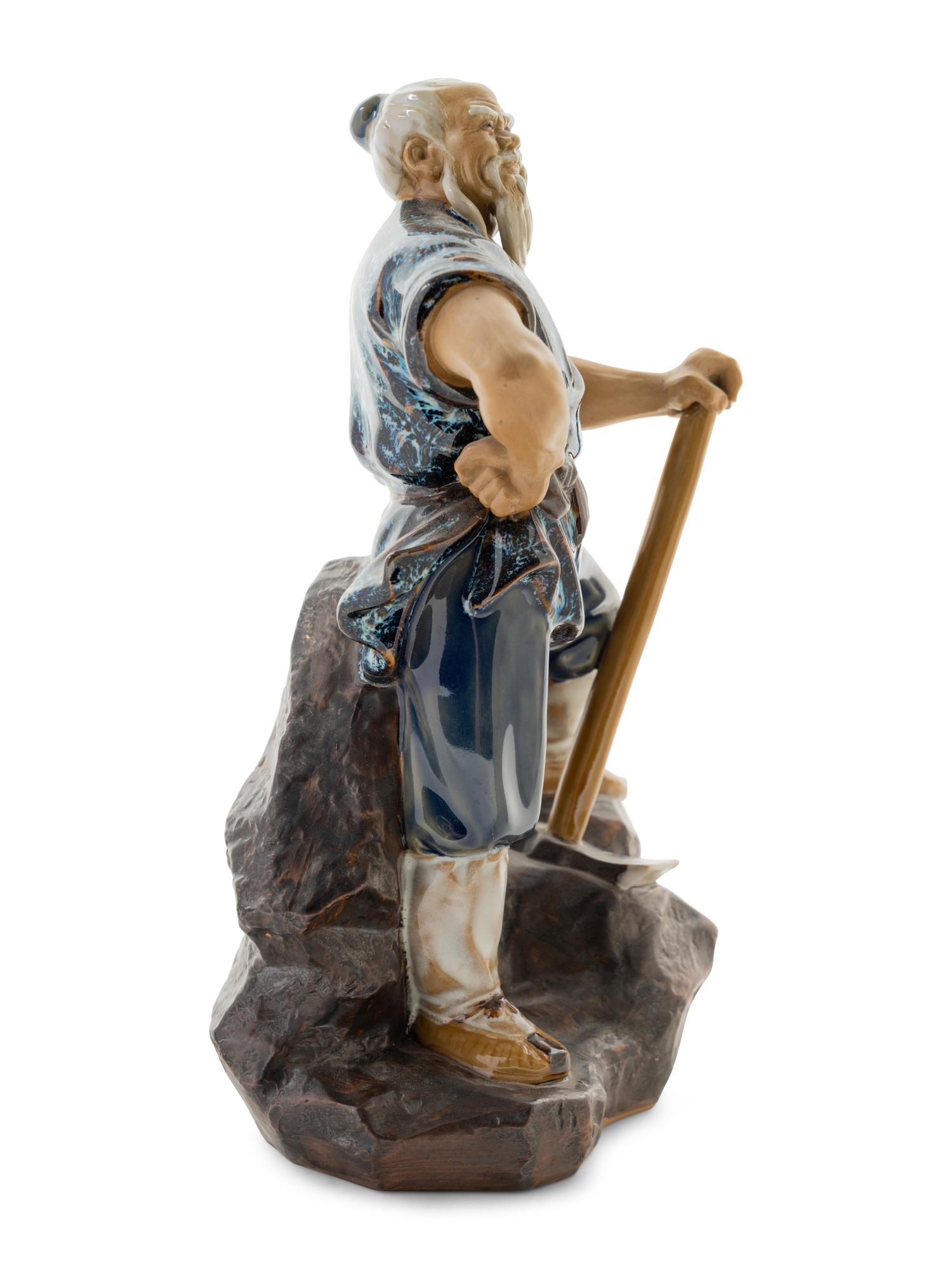 A Chinese Ceramic Figure of a Man