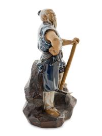 A Chinese Ceramic Figure of a Man