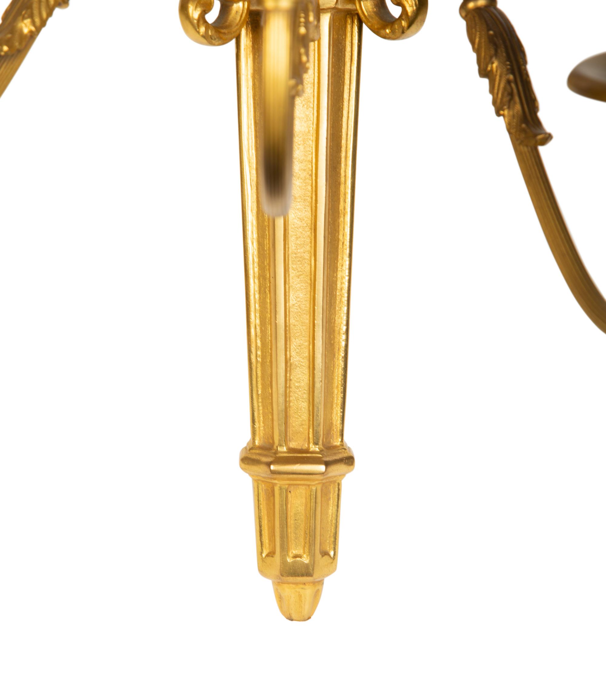 A Set of Four Gilt Bronze Five-Light Sconces