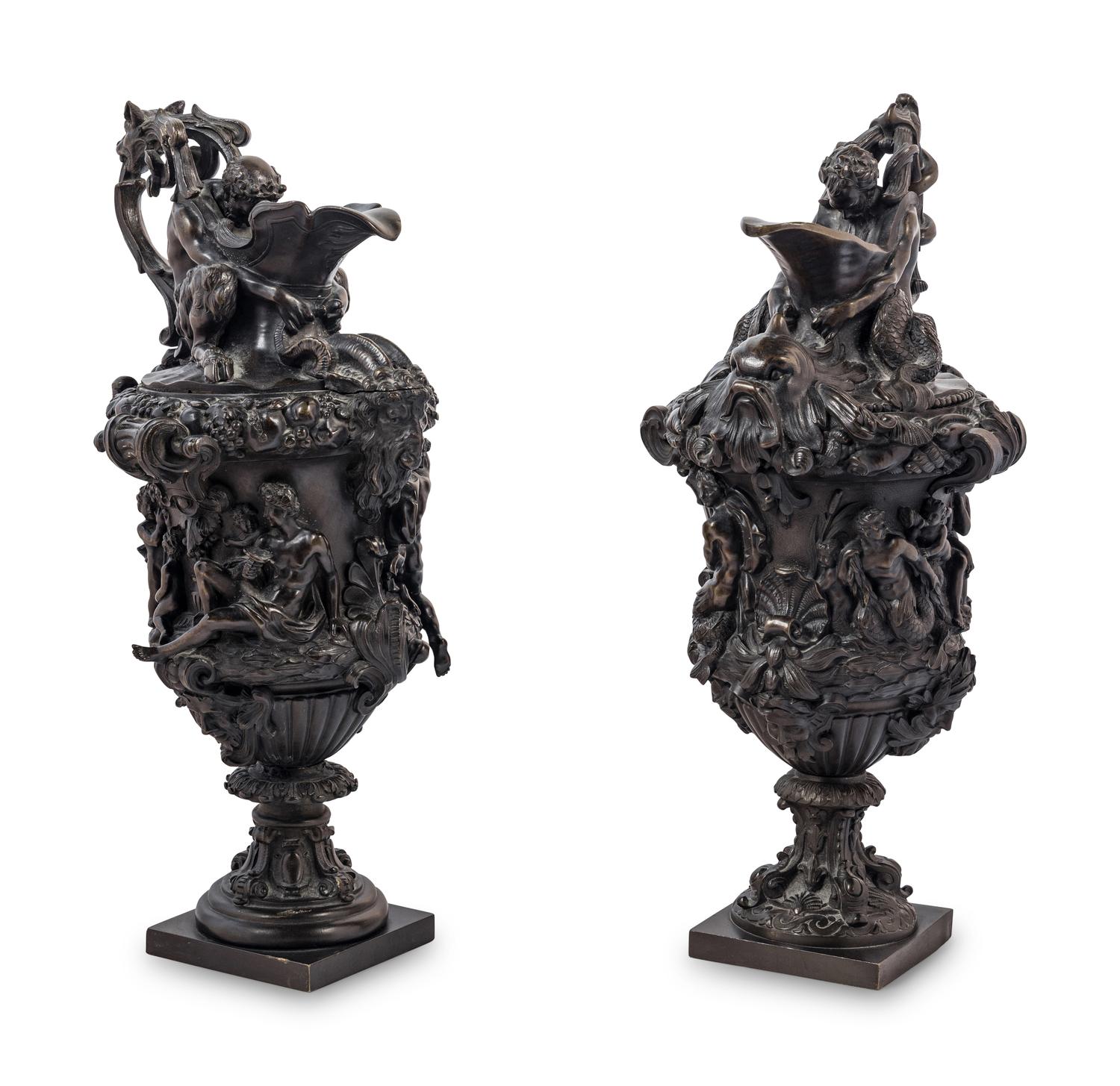 A Pair of Grand Tour Bronze Ewers Emblematic of Water and Earth