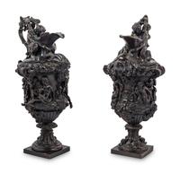 A Pair of Grand Tour Bronze Ewers Emblematic of Water and Earth