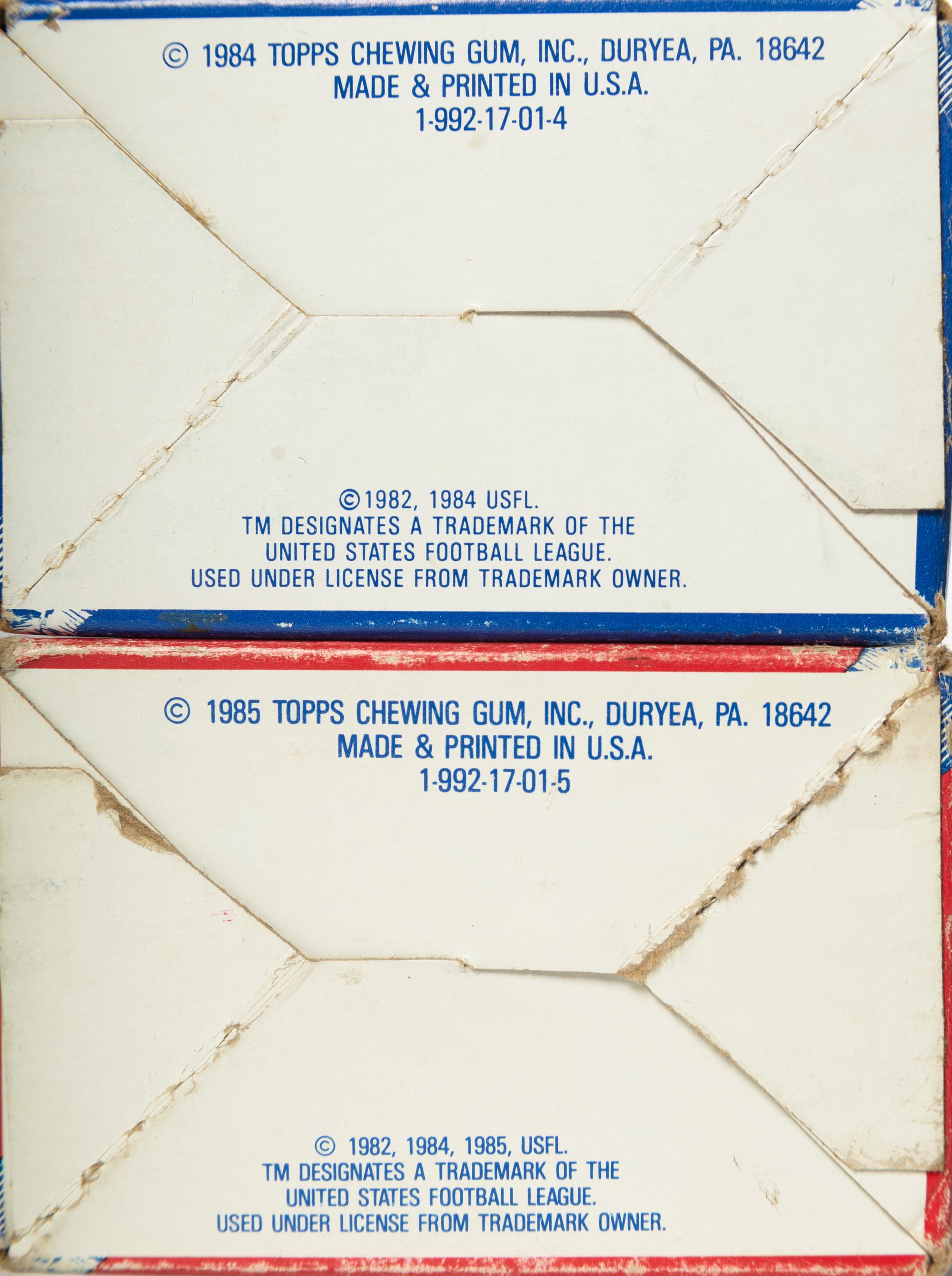 A Group of 1984 and 1985 Topps USFL Complete Sets In Factory Issued Boxes