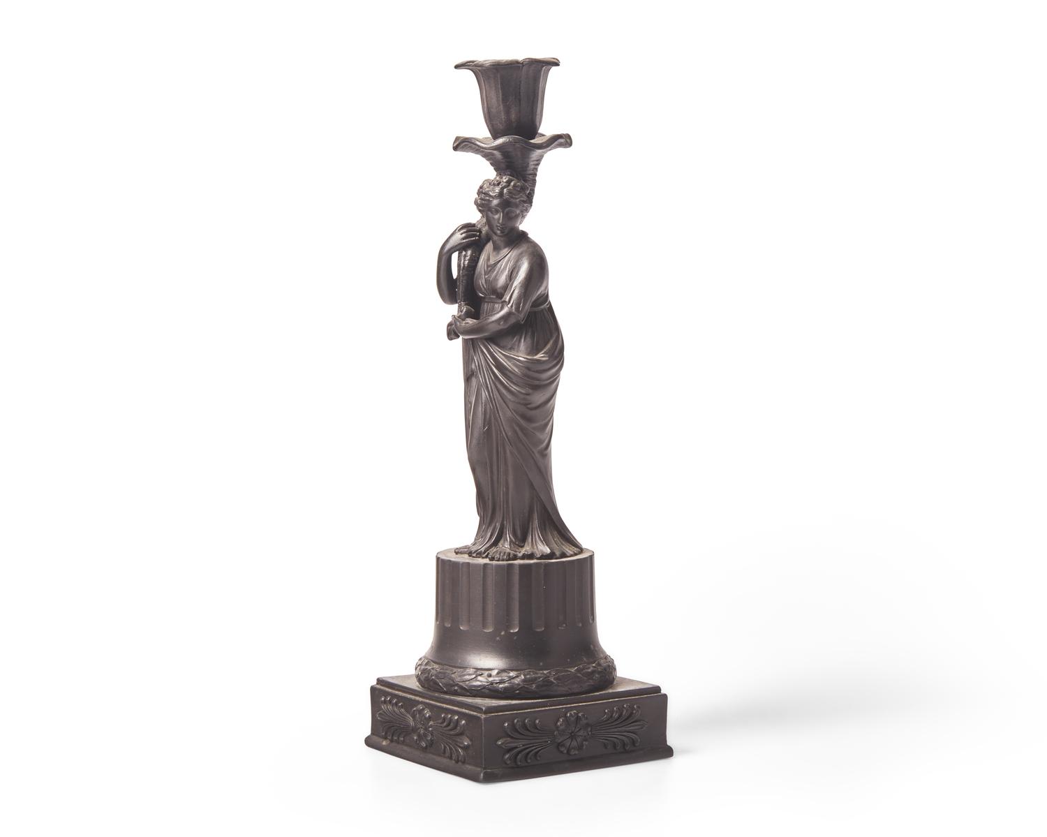 A Wedgwood Black Basalt 'Ceres' Figural Candlestick