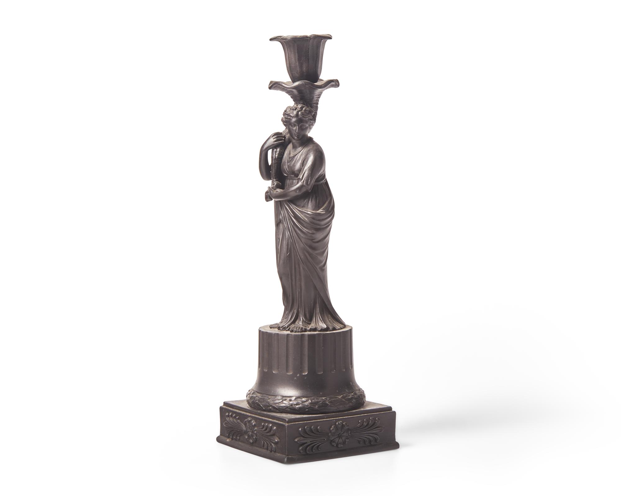 A Wedgwood Black Basalt 'Ceres' Figural Candlestick