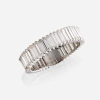 A diamond and eighteen karat white gold ring
