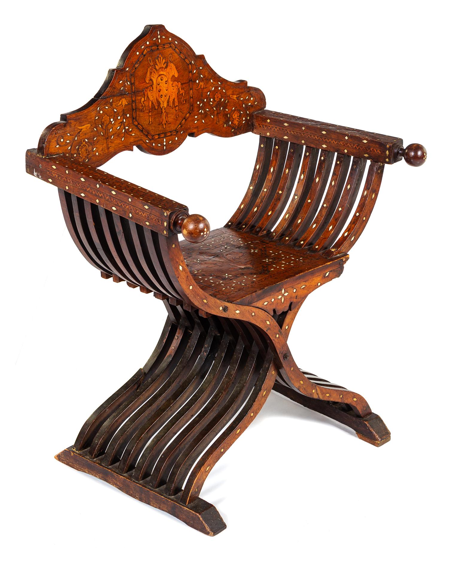 An Italian Mother-of-Pearl, Basswood and Ebony Inlaid Walnut Savonarola Chair Height 36 x width 28 1/2 x depth 20 inches. — LATE 19TH/EARLY 20TH CENTURY