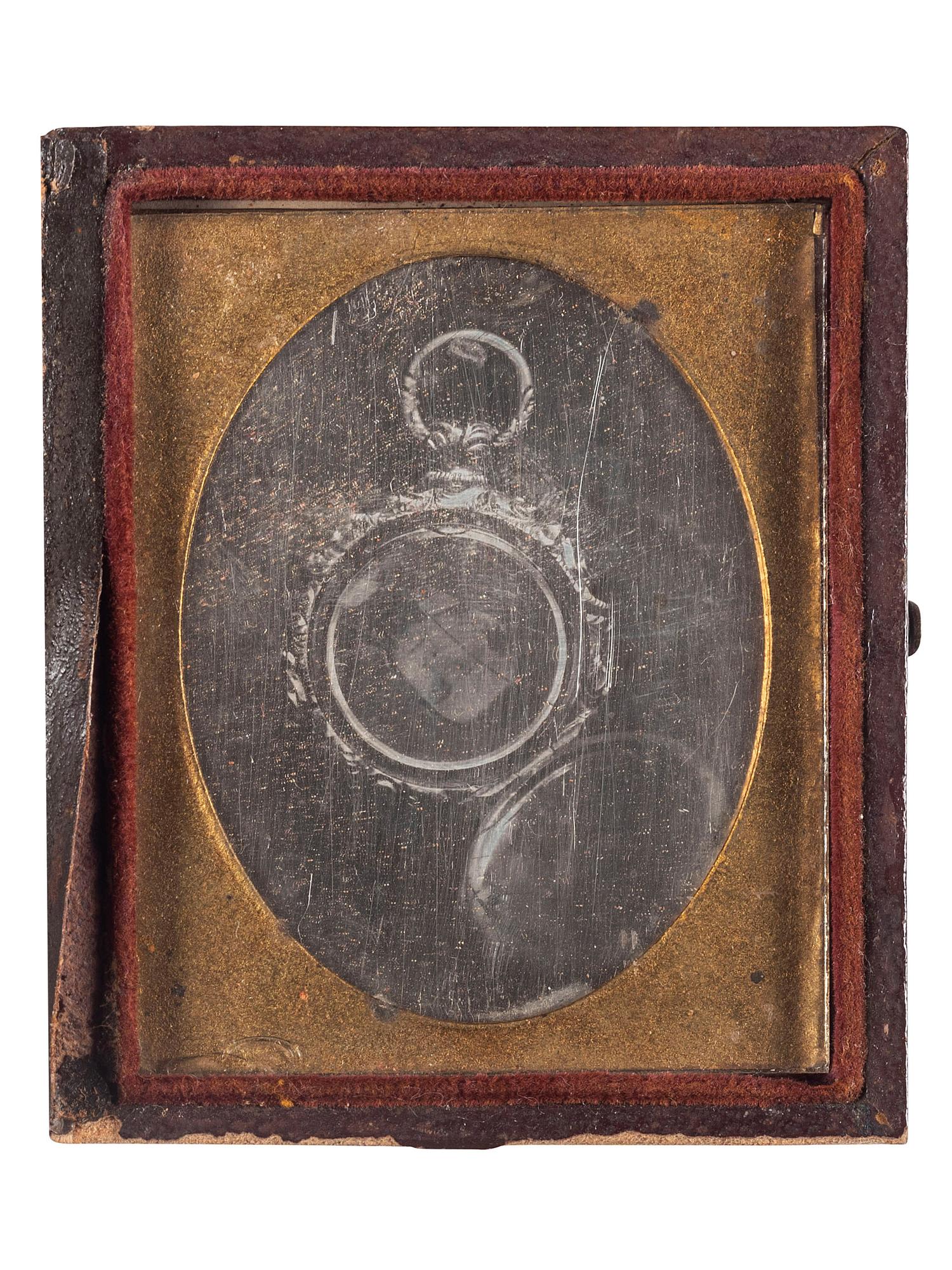 [EARLY PHOTOGRAPHY]. Ninth plate experimental daguerreotype of a Daguerreian locket.