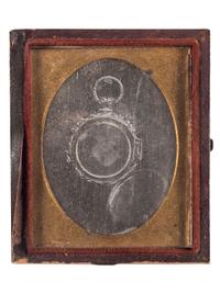 [EARLY PHOTOGRAPHY]. Ninth plate experimental daguerreotype of a Daguerreian locket.