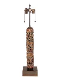 A Chinese Pierce Carved, Painted and Gilt Wood Lamp with a Linen Shade