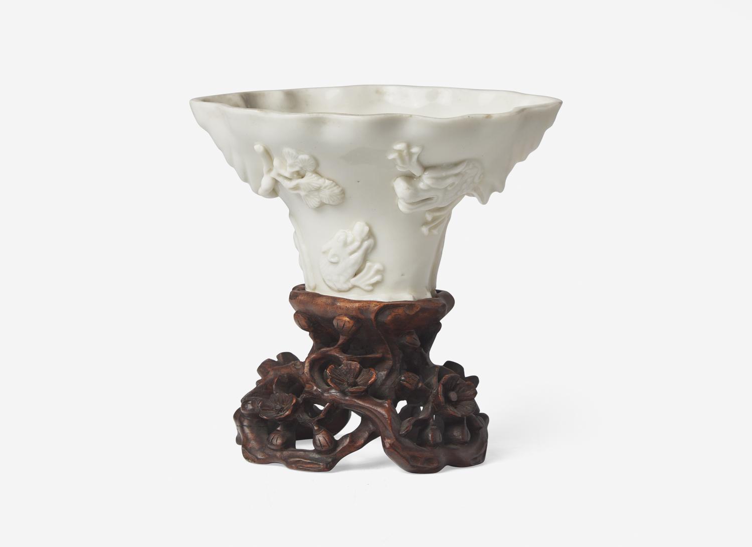 Three Chinese Dehua Porcelain Libation Cups and a Wood Stand