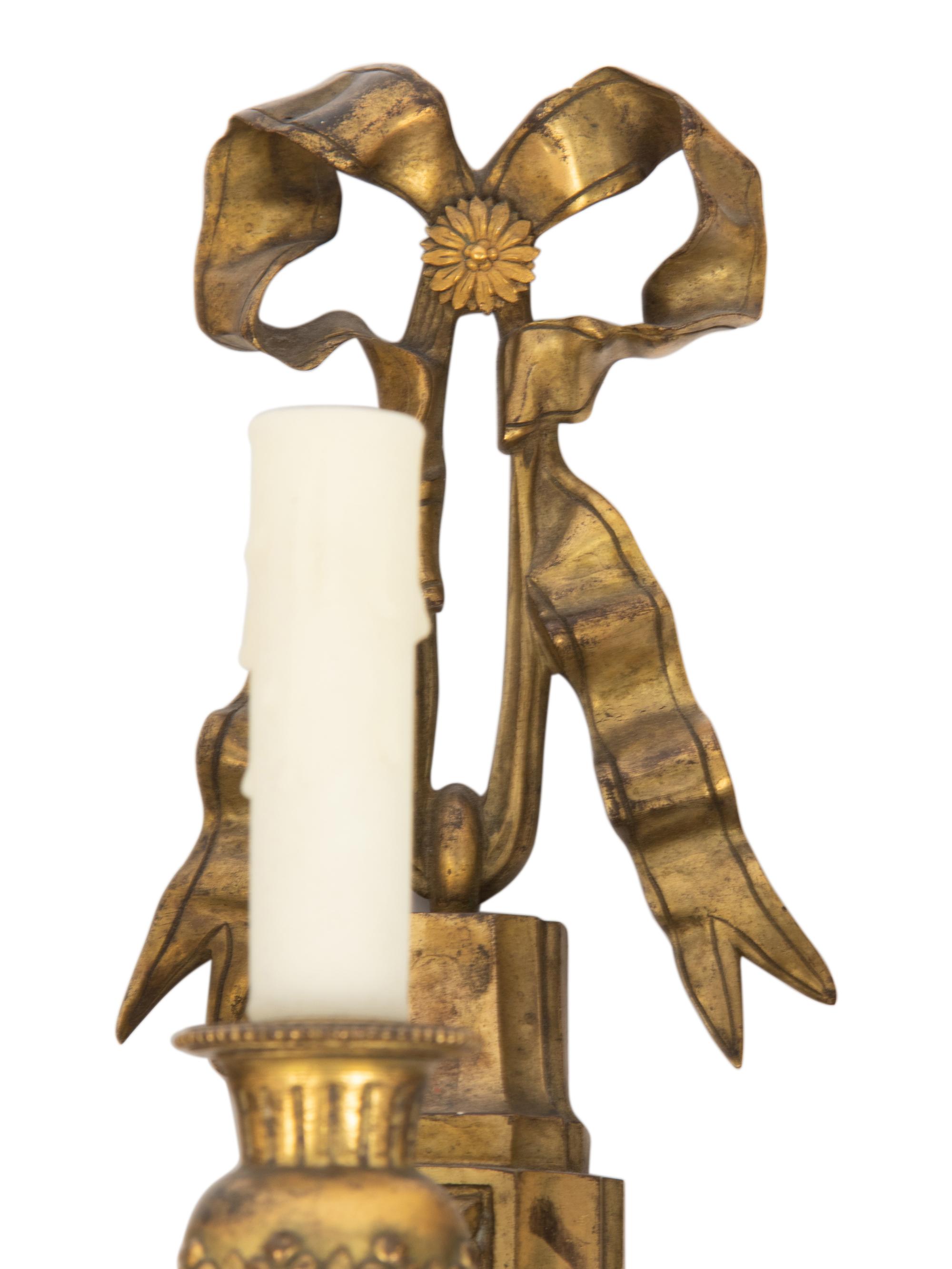 A Pair of Louis XVI Style Gilt Bronze Five-Light Sconces