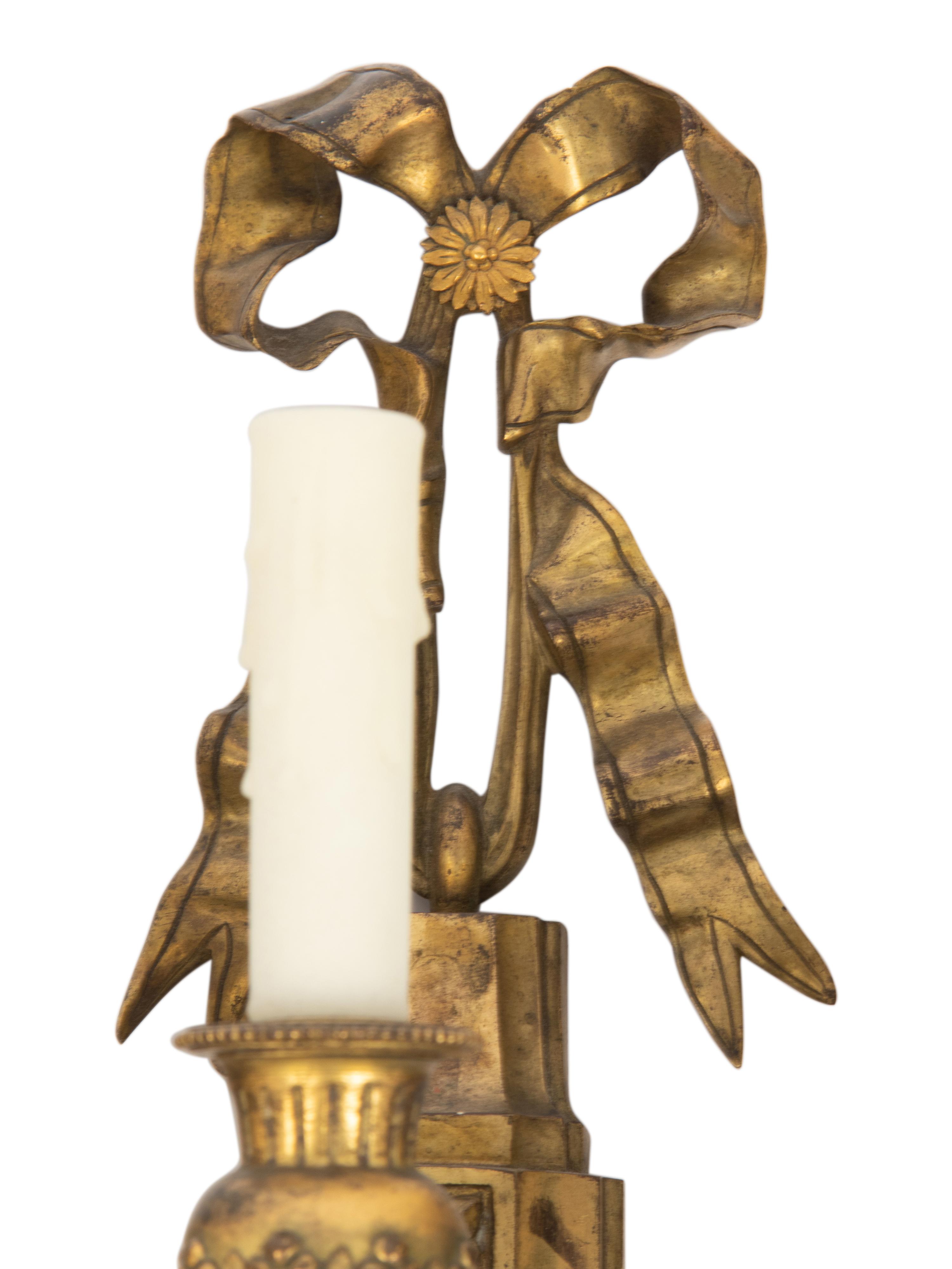 A Pair of Louis XVI Style Gilt Bronze Five-Light Sconces