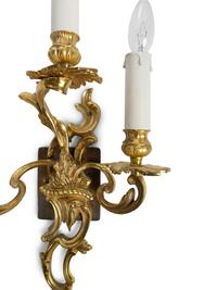 A Pair of Louis XV Style Gilt Bronze Three-Light Wall Sconces — 20TH CENTURY