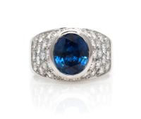 An 18 Karat White Gold, Sapphire and Diamond and Ring, 5.30 dwts.