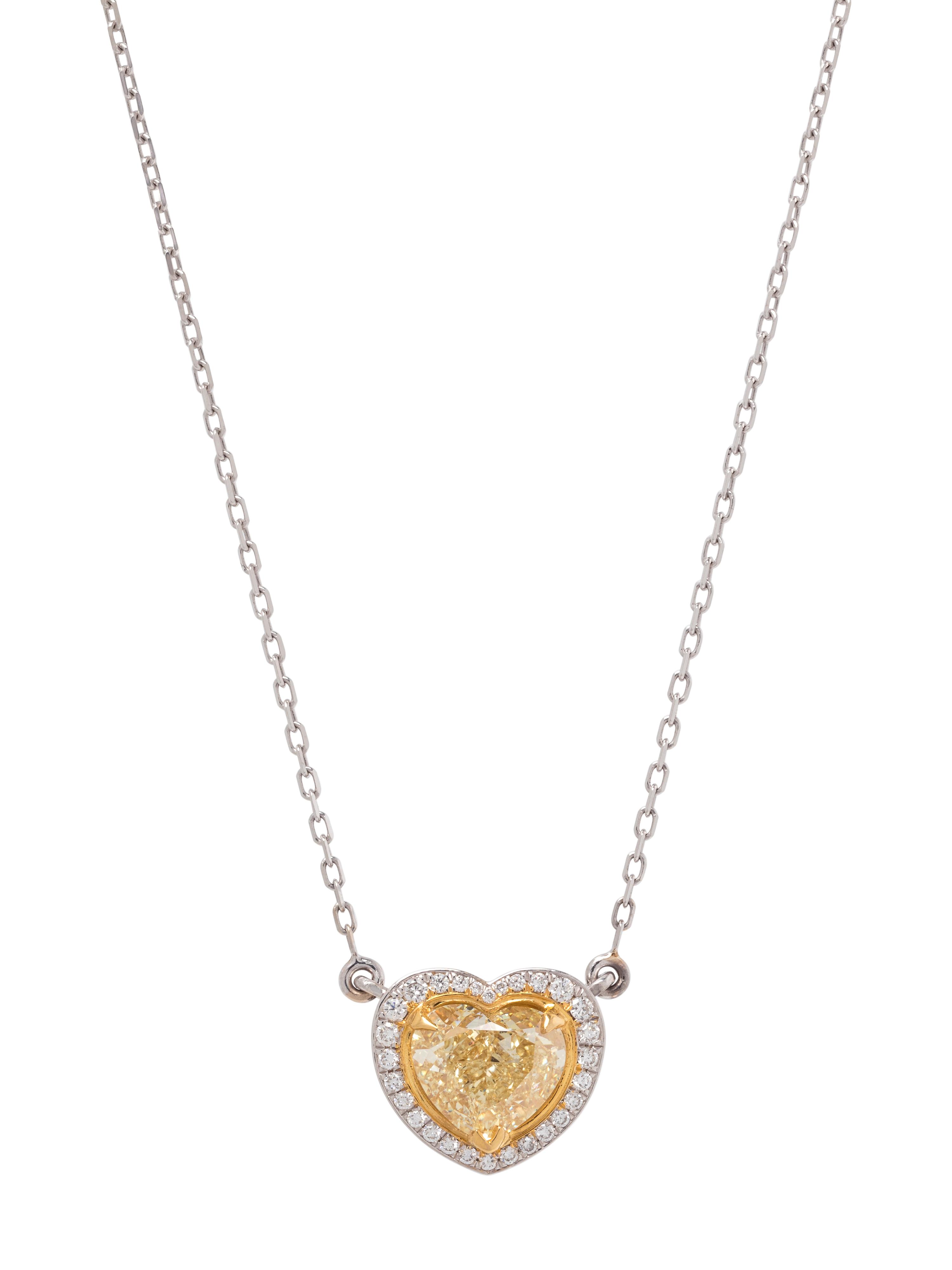 FANCY LIGHT YELLOW DIAMOND AND DIAMOND PENDANT/NECKLACE