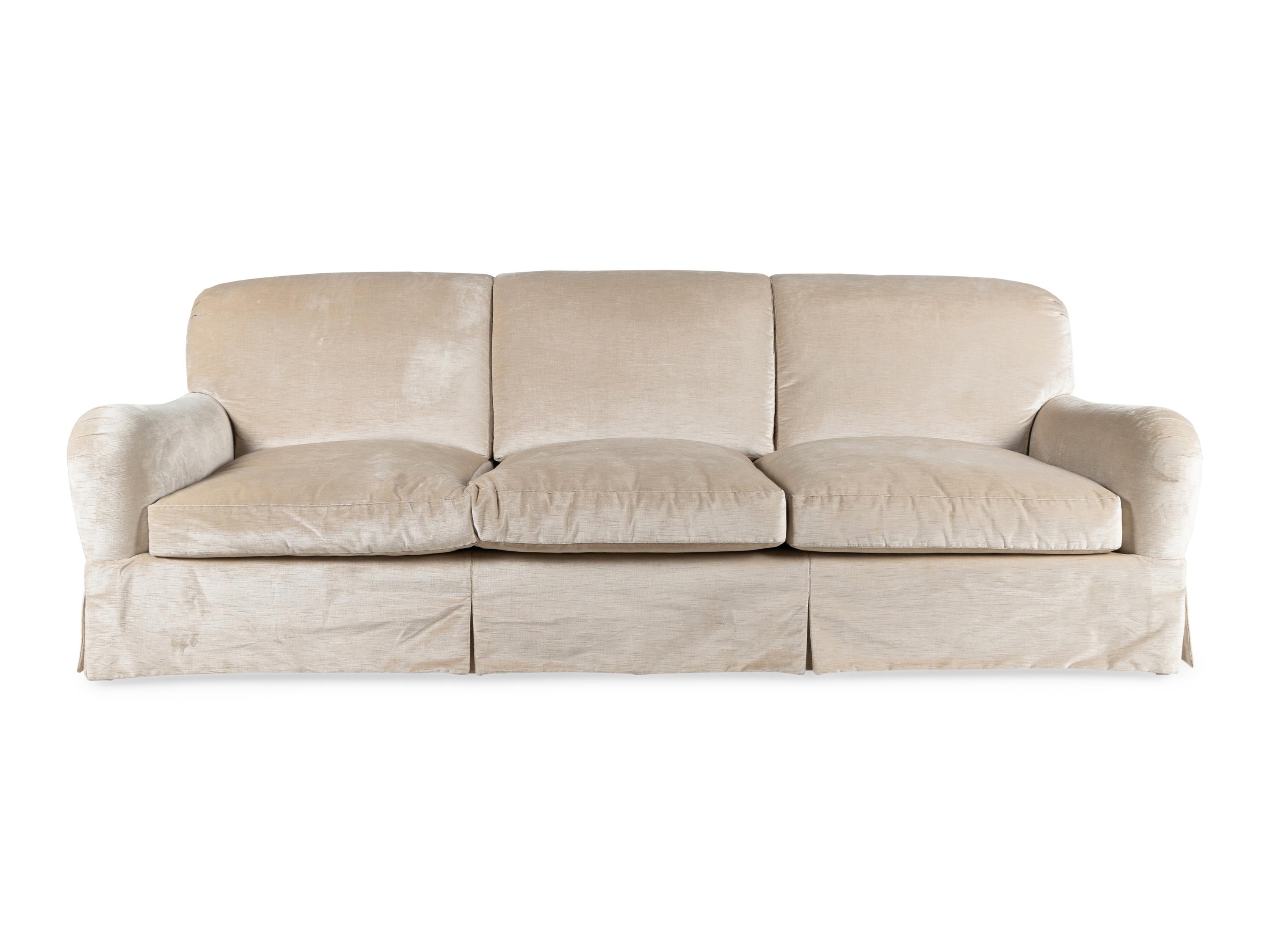 A Velvet-Upholstered Three-Cushion Sofa